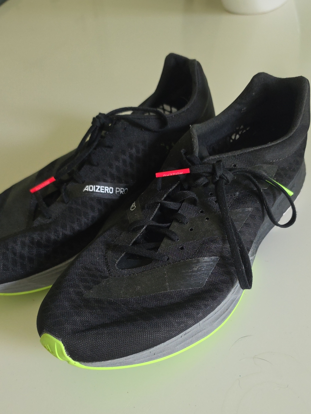adidas Adizero Pro Racing Shoes in Black with Neon Green and Red Accents